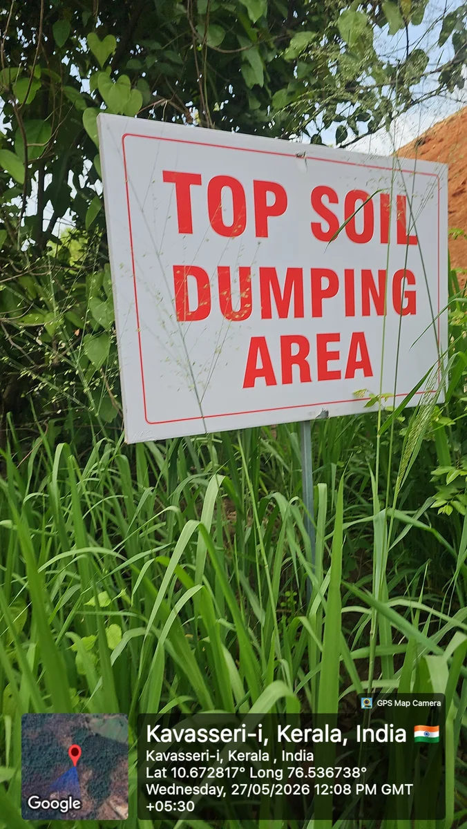 Environmental compliance signboard designating the top soil preservation and dumping area